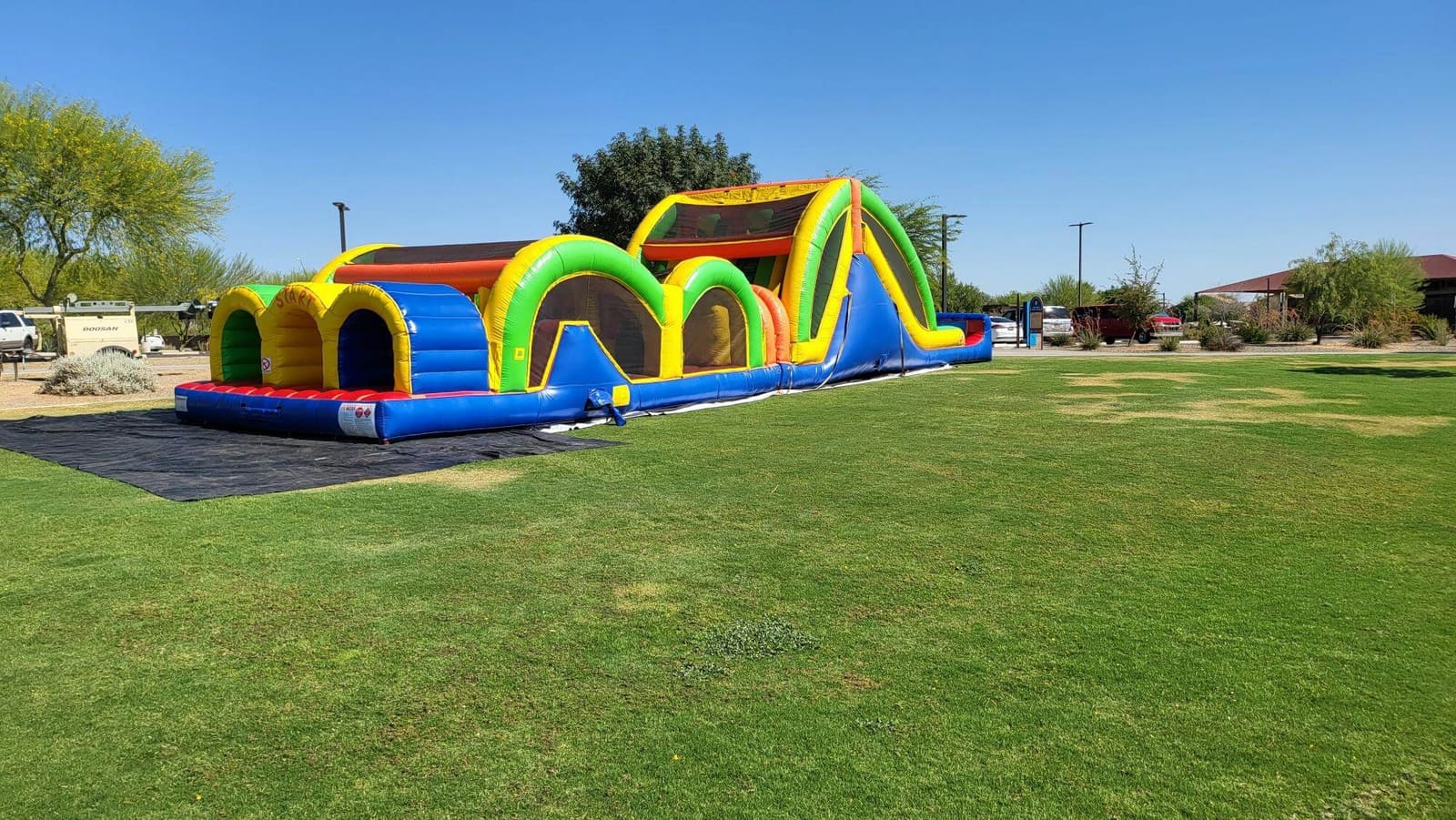 Rent our 63ft Triple Lane Obstacle Course in Phoenix, Scottsdale, Mesa, Chandler & Gilbert. Triple the lanes, triple the fun for all ages!